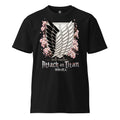 A black short-sleeve crewneck t-shirt featuring a large Attack on Titan Scout Regiment graphic on the front. The graphic includes the Survey Corps crest with pink cherry blossoms and the text 'Attack on Titan' and 'Scout Regiment'.